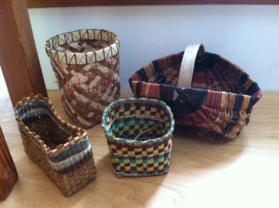 Paula's tiny baskets. The one on the right is her first ribbed basket.